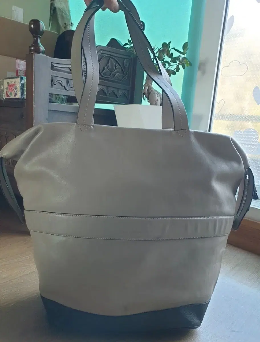 이탈리아 럭셔리 브랜드 엠포리오 아르마니(Emporio Armani)의 올가죽 보스턴 골프백 또는 여행용 가방