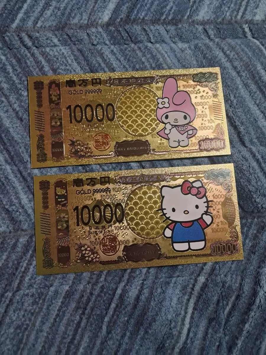 [급전] 헬로키티 마이멜로디 금박 기념 지폐 2장