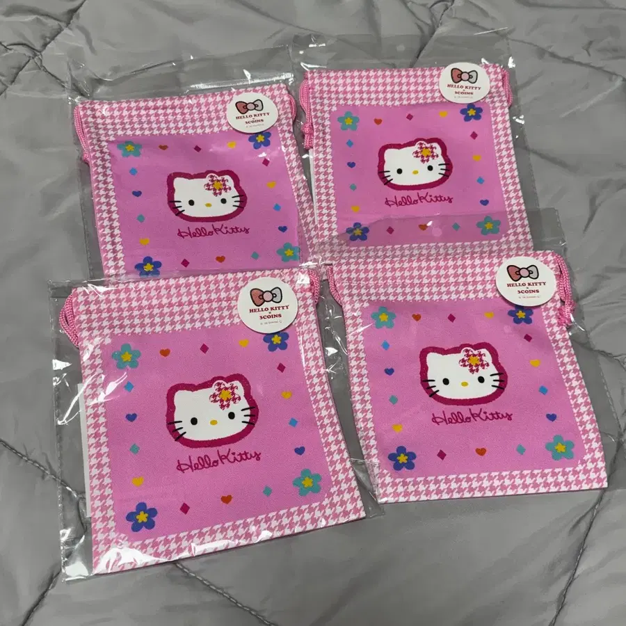 쓰리코인즈 3COINSx헬로키티 카오하나 복조리 파우치