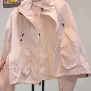 여성 바람막이 자켓 아이보리 색상
