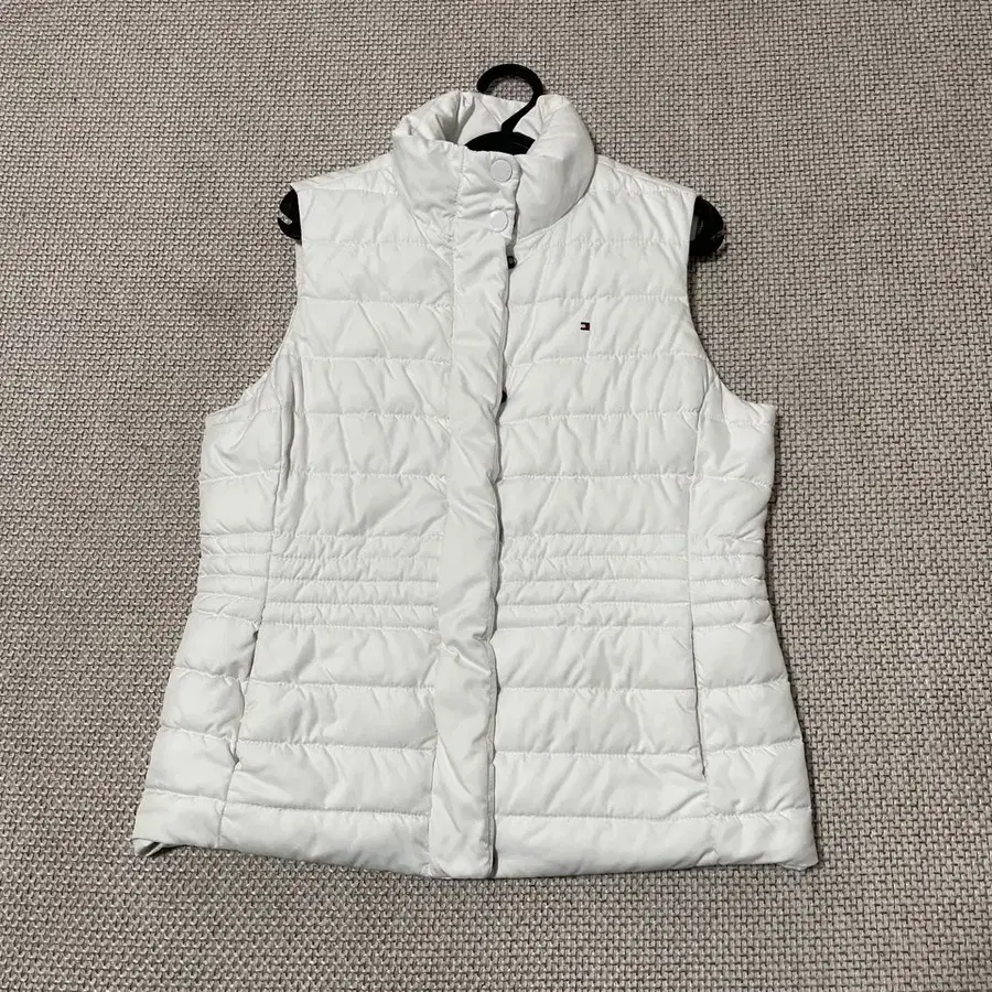 M 타미힐피거 여성 패딩 조끼 B.7307