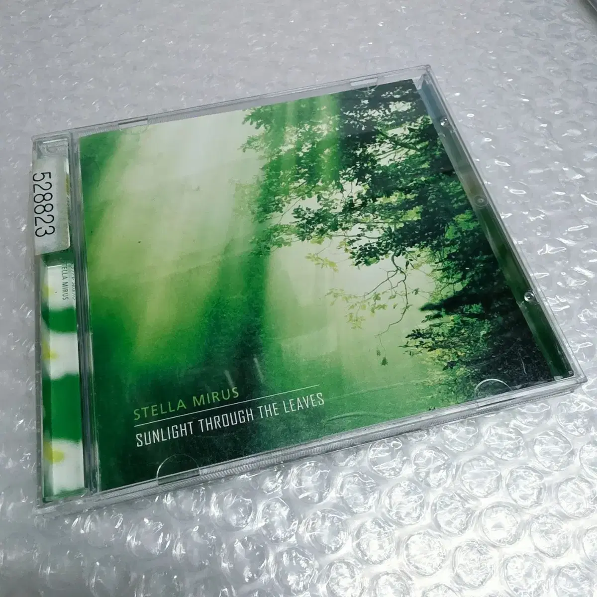 Stella Mirus - Sunlight Through the Leaves