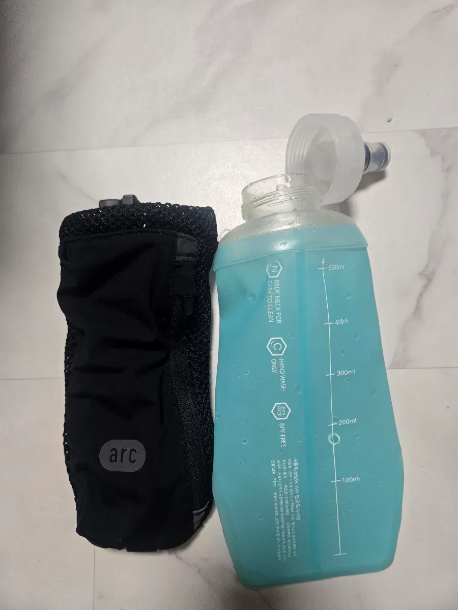 arc 핸드물병 파우치 러닝 팝니다.