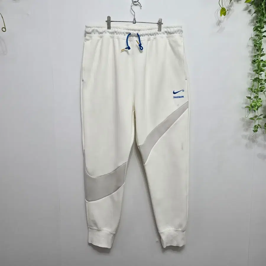 나이키 테크플리스 스우시 조거 팬츠