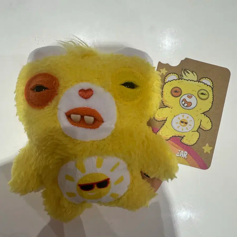 퍼글러 케어베어 노란색