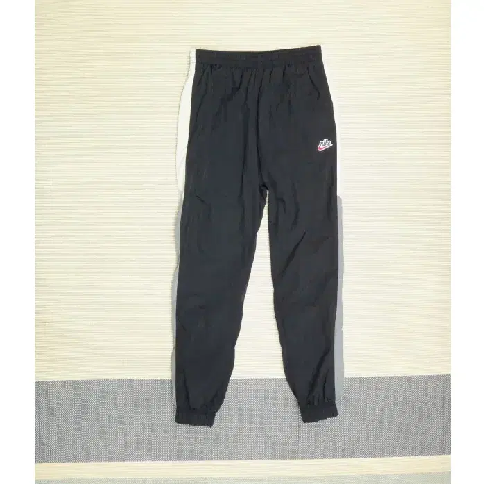 (M/80) 나이키 NSW HE 윈드러너 우븐 시그널 팬츠
