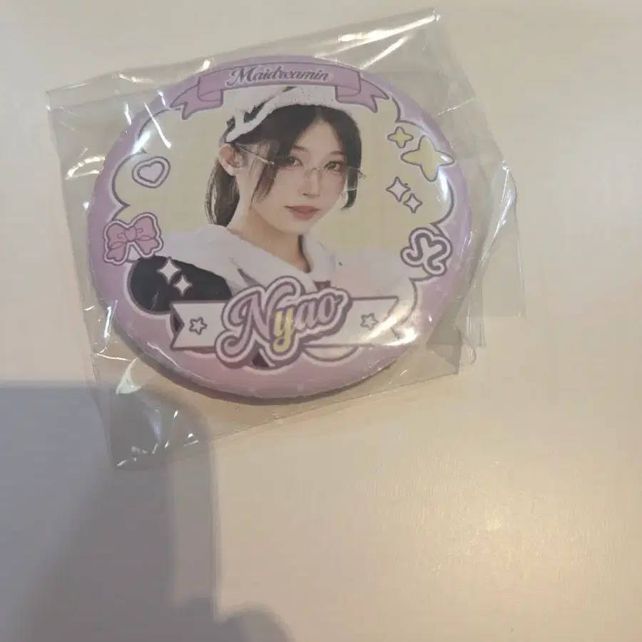 메이도리밍 냐오 뱃지