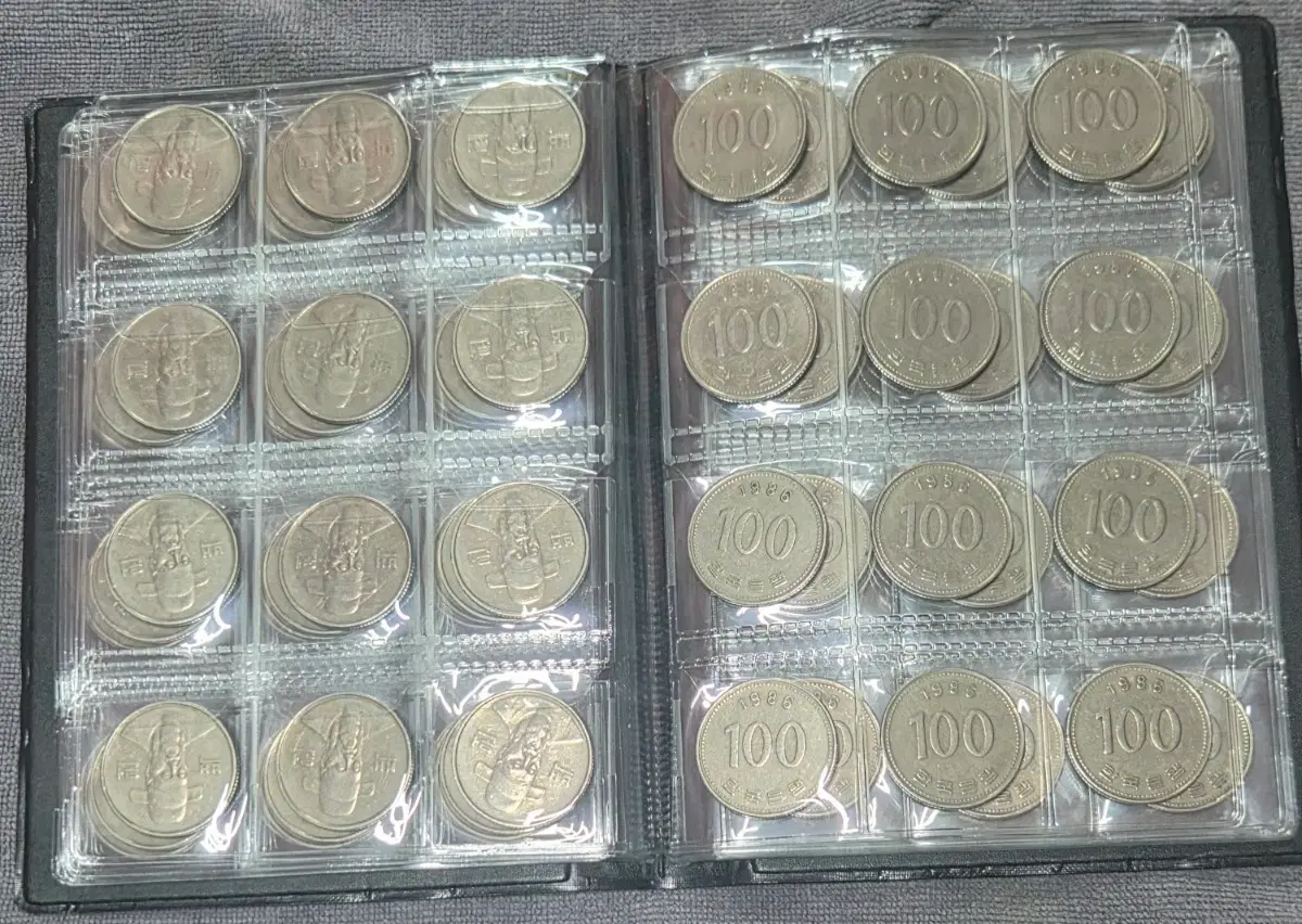 1986년 100원 120개 동전앨범(깨끗함)