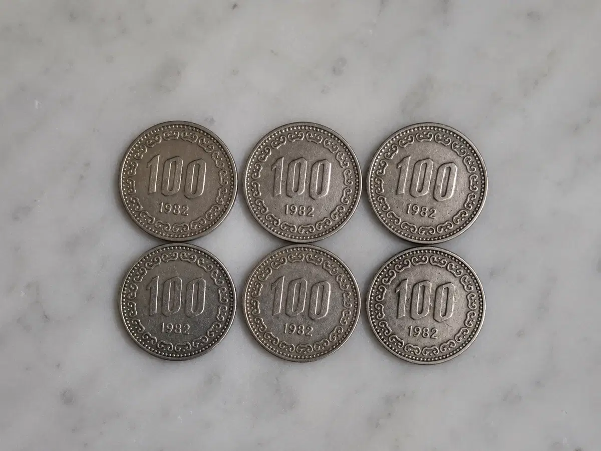 1982년 100원 동전 6개
