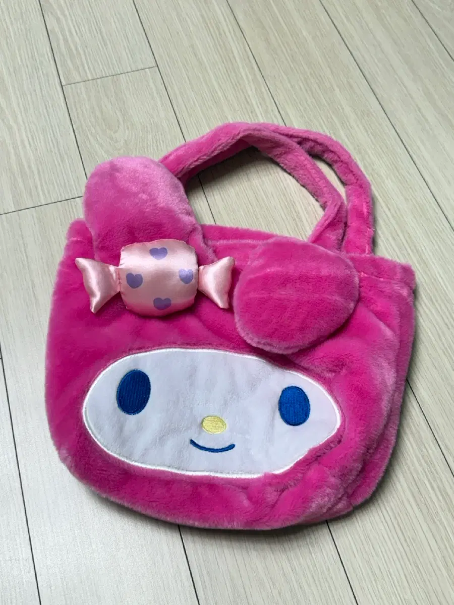 마이멜로디 아타리쿠지 핑크 퍼 가방