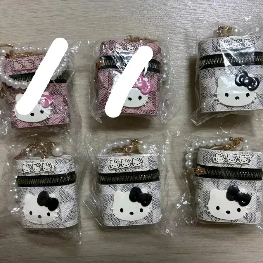 산리오 헬로키티 키티 수납 보관 키링 미니 파우치 진주 스트랩 포함 새상품