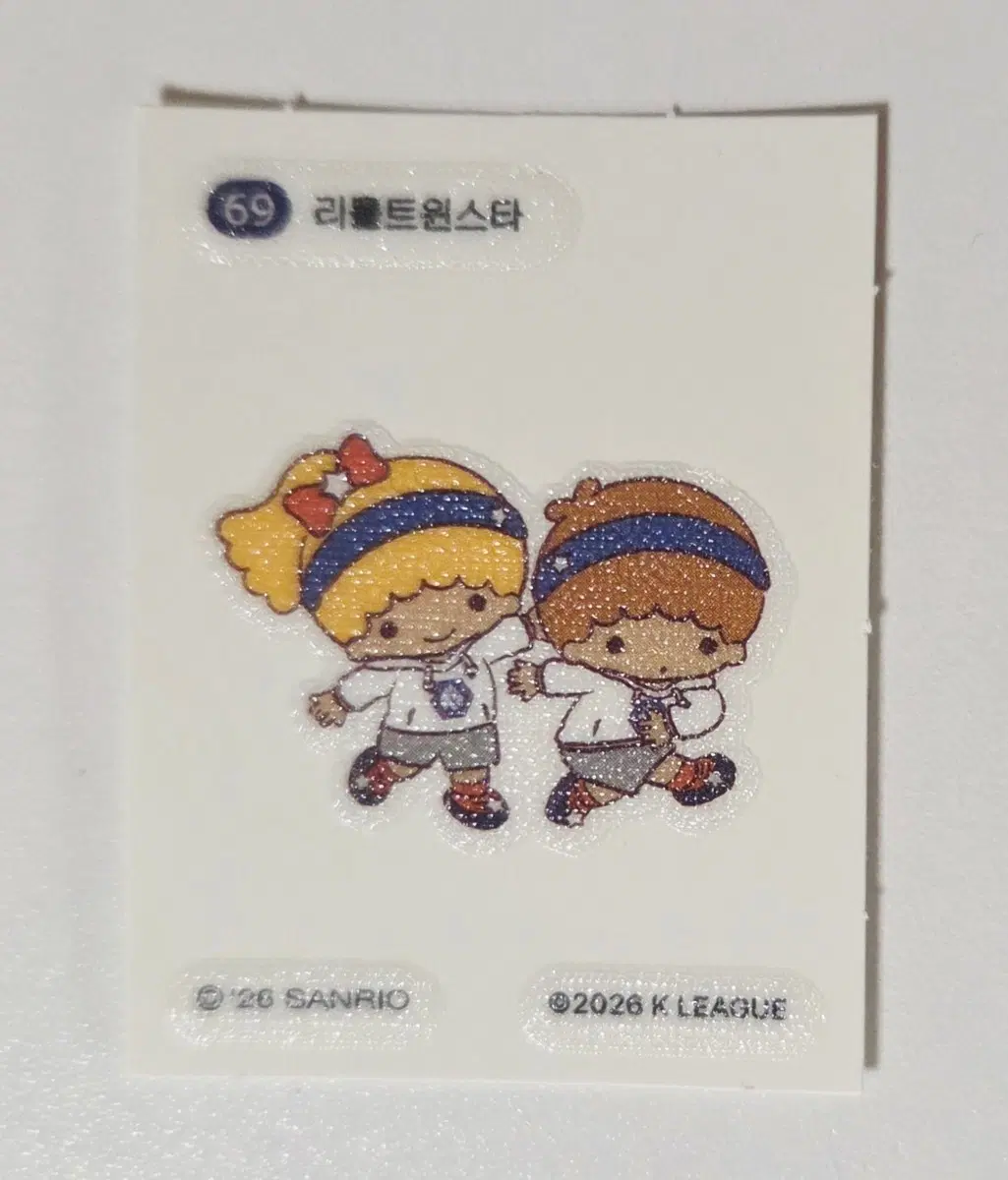 산리오 캐릭터즈 태닝 띠부씰 스티커 리틀트윈스타 69번 세븐일레븐 k리그 축구 굿즈