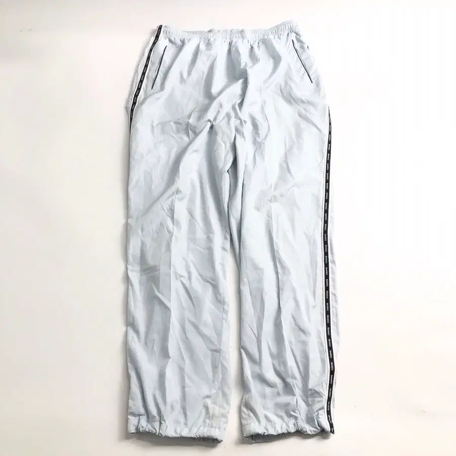 라인 트랙 팬츠