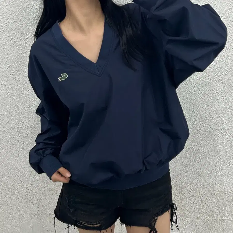 라코스테 패치로고 네이비 브이넥 바람막이 100