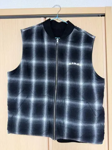 XLARGE 체크 무늬 퀼팅 베스트
