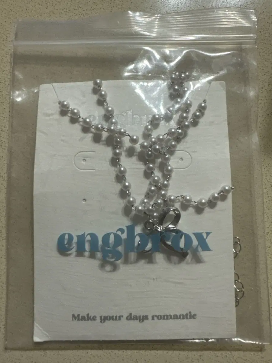 앵브록스 리본 진주 목걸이