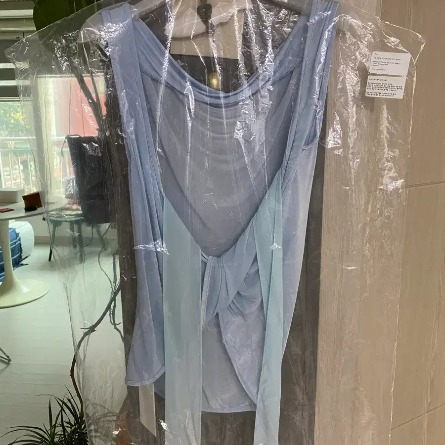 Teak 티크 슬리브리스 탑 TIE-NECK SLEEVELESS TOP
