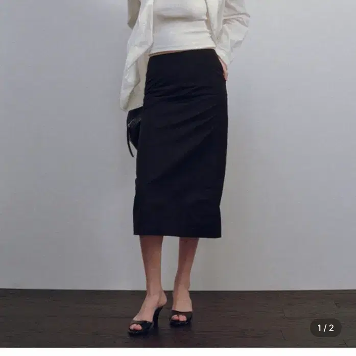 낫띵리튼 stitch h-line maxi skirt