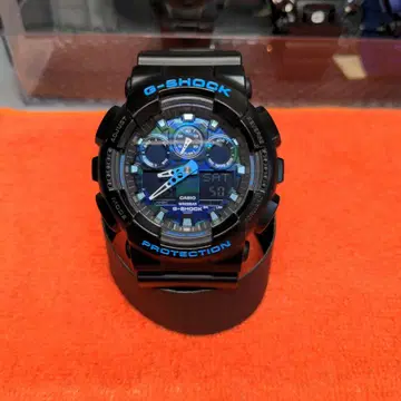 CASIO G-SHOCK GA-100CB-1AJF 블루 블랙 카모 패턴
