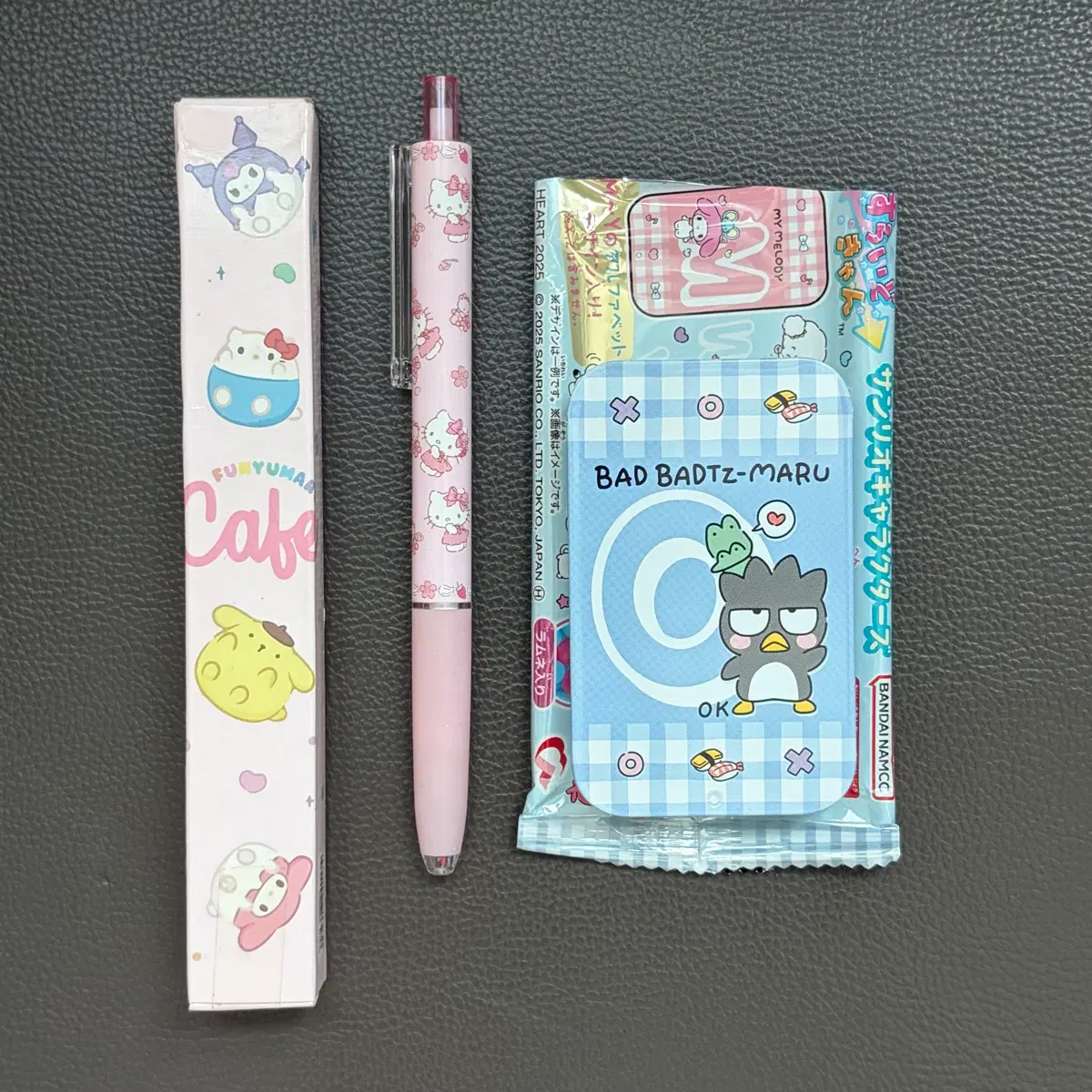반다이 산리오 알파벳 시즌2 라무네 틴케이스 배드바츠마루 판매