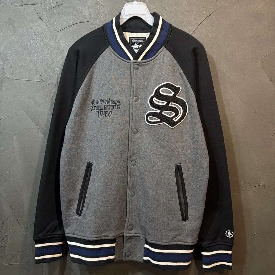 [S] Stussy Tribe 스투시 스타디움 자켓
