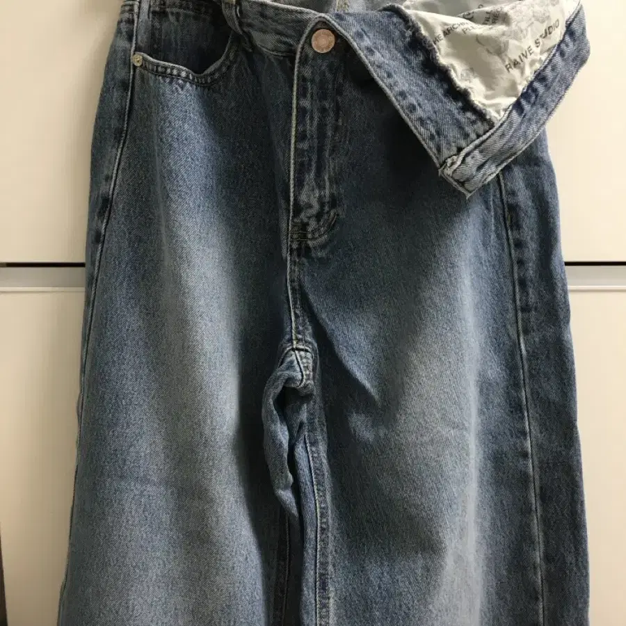 RAIVE unbalanced waist print denim