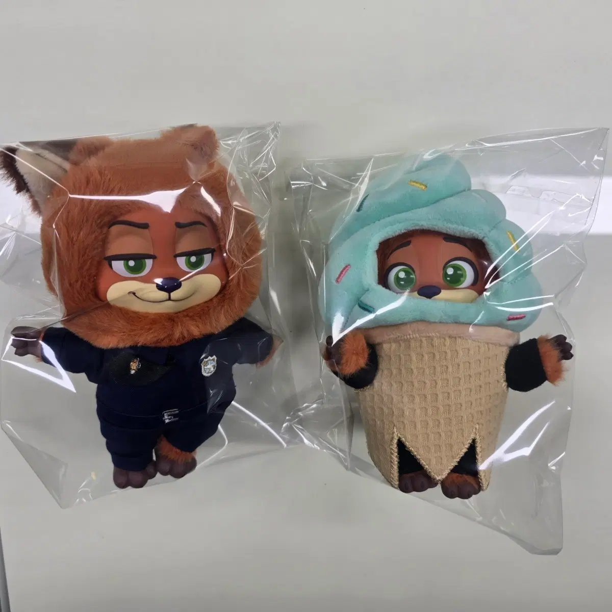 [일괄] 탑토이 주토피아 닉 와일드 인형 2종 (경찰 + 민트 아이스크림)