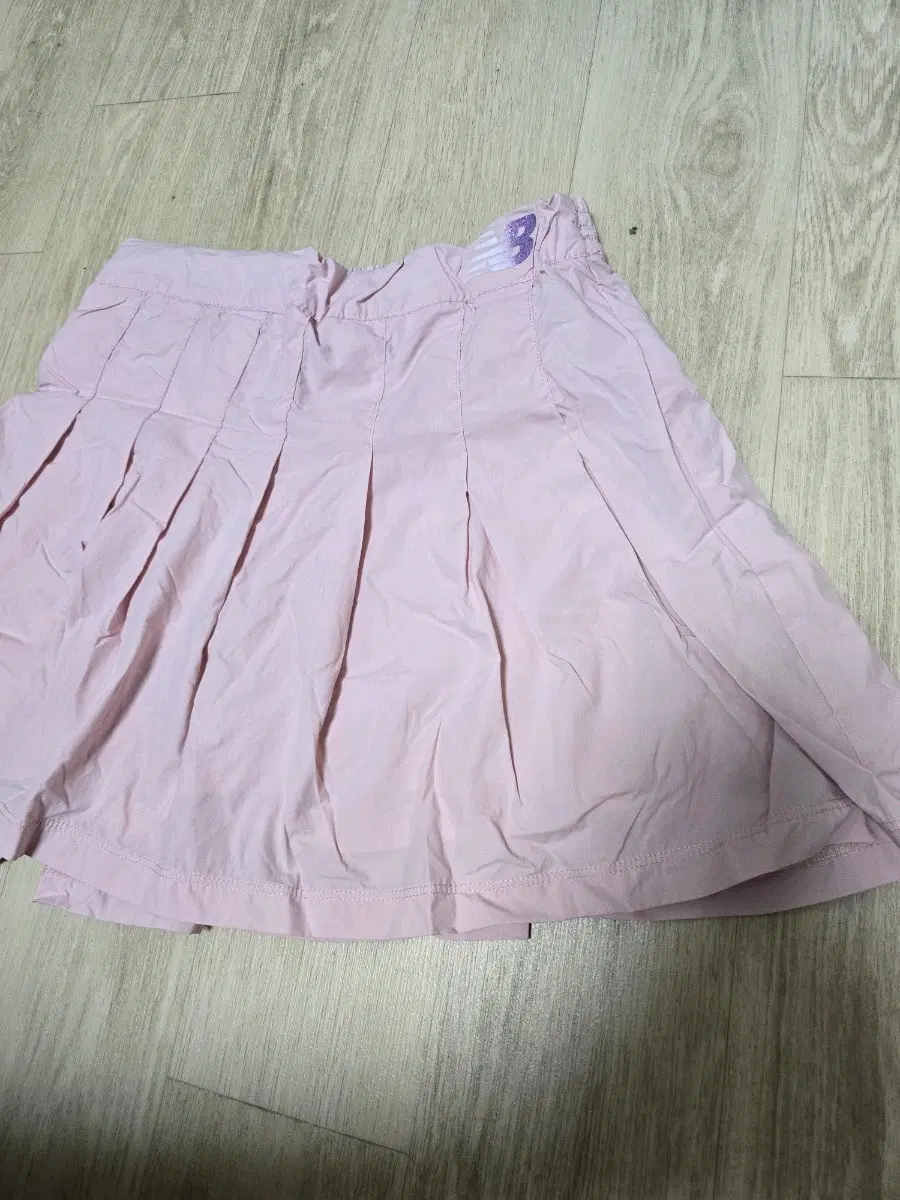 뉴발란스 키즈 주름스커트 150