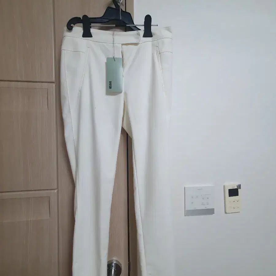 시스템 아이보리 바지