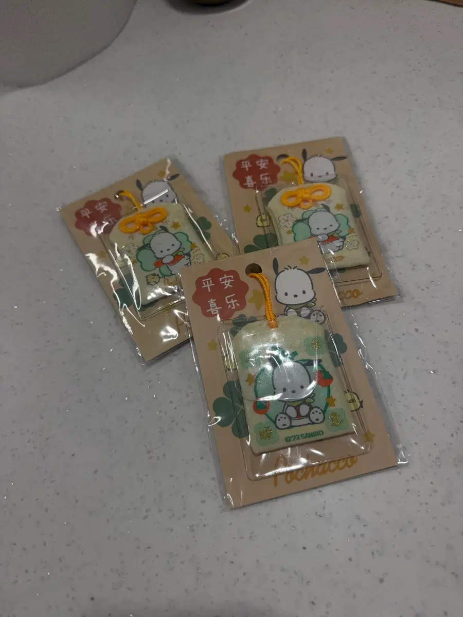 산리오 오마모리 부적 키링 포차코