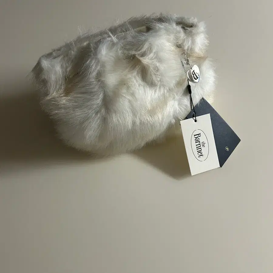 더바넷 퍼 백팩 아이보리 Fur Drawstring Backpack_Ivory