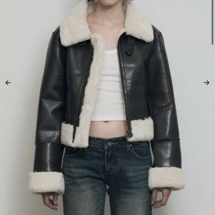 보헴서 슬림핏 무스탕 다크브라운