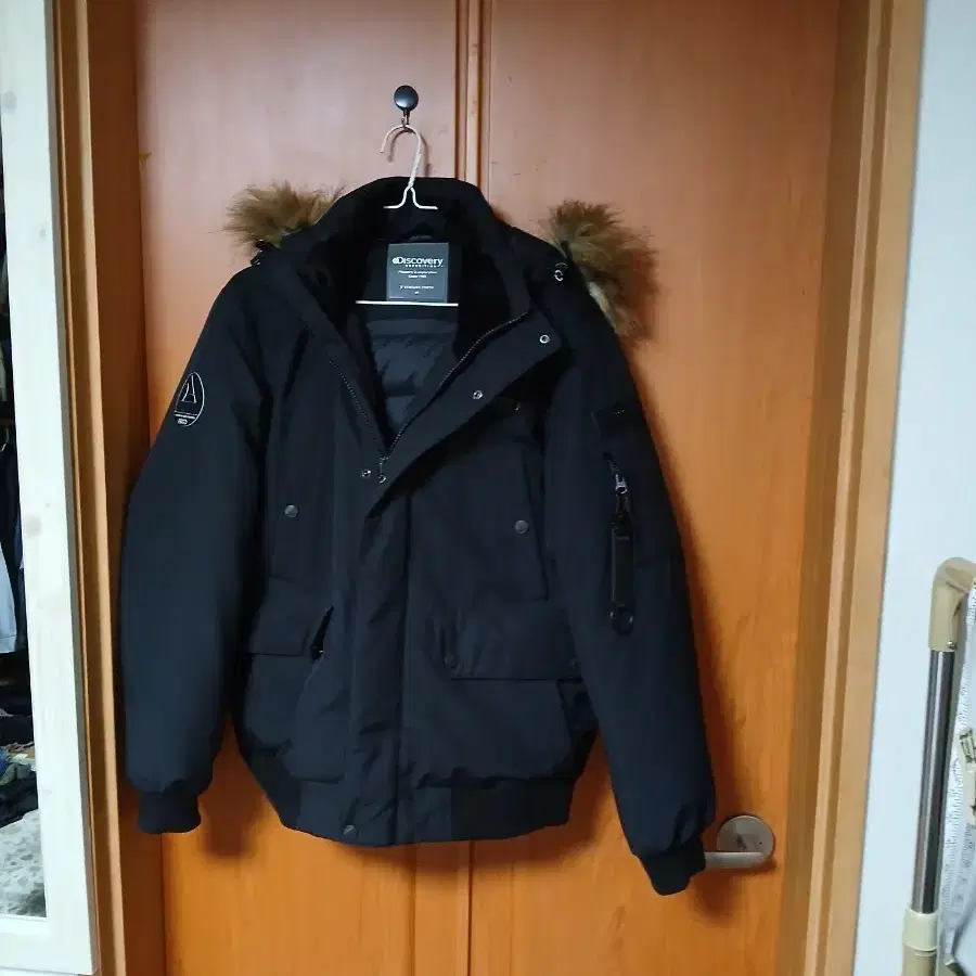 디스커버리 익스페디션 패딩 검정색