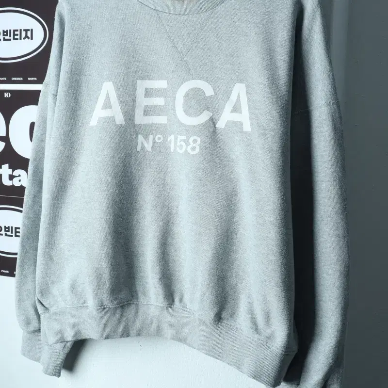 W(M-XL) 에이카화이트 맨투맨 티셔츠 빅로고 세미크롭-H38796