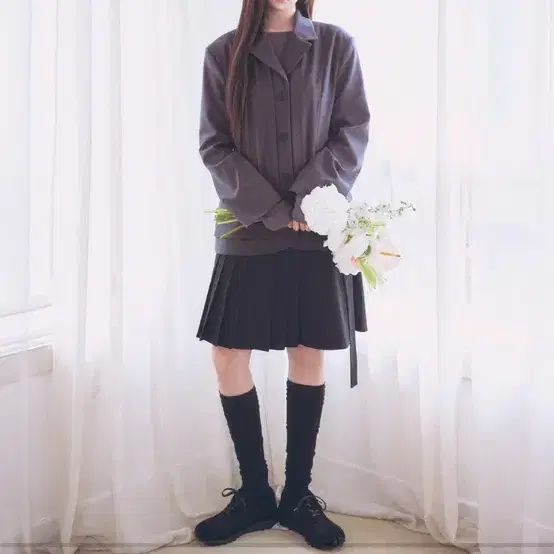 미세키서울 Diagonal belted midi skirt BLACK