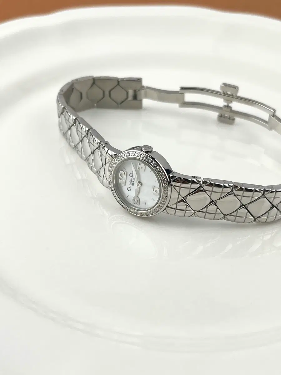 DIOR Lady Dia bezel shell mini watch