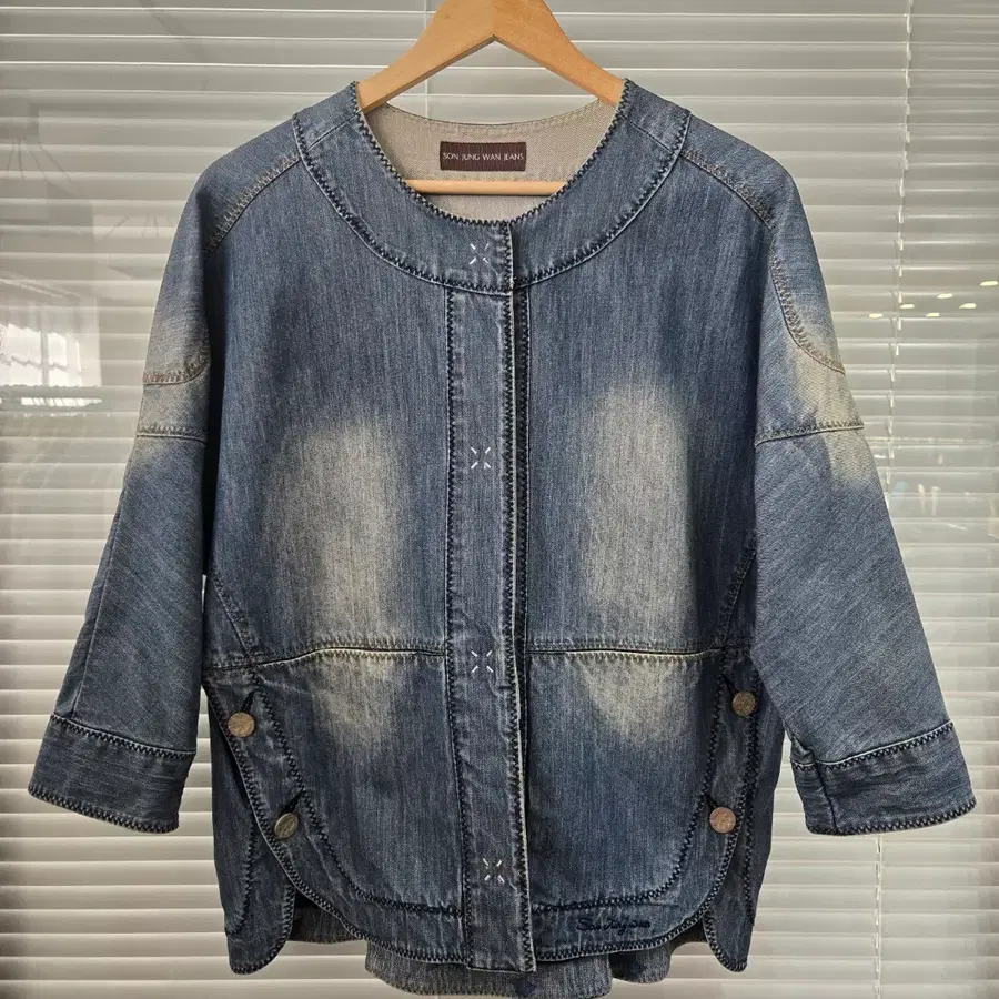 손정완 돌만슬리브 노칼라 데님 자켓