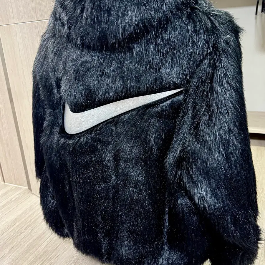 나이키 엠부쉬 퍼자켓