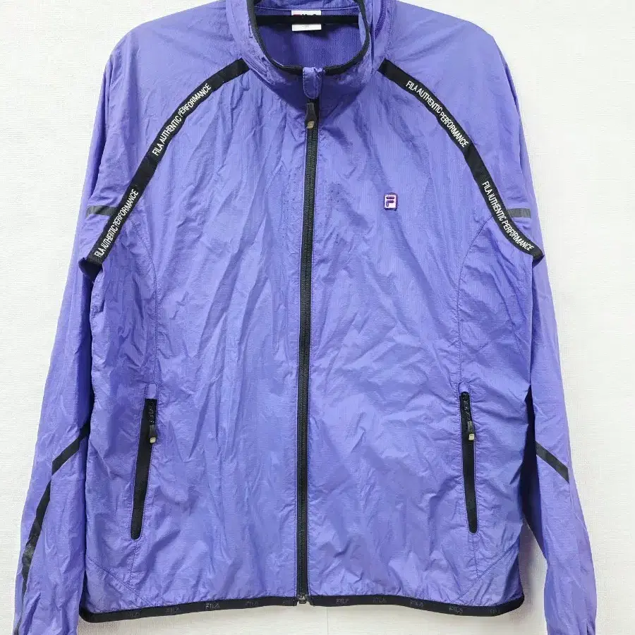 [남성 105/XL] 휠라(FILA) 레터링 테이프 경량 바람막이 자켓 (퍼플)