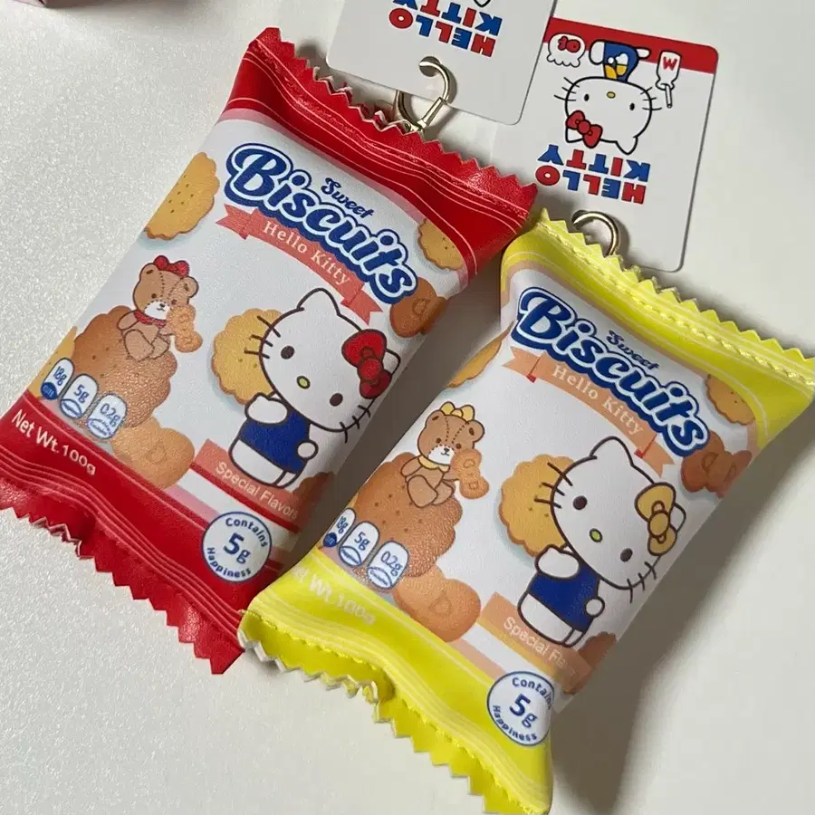 산리오 헬로키티 비스킷 파우치 키링 동전지갑 에어팟케이스 인형