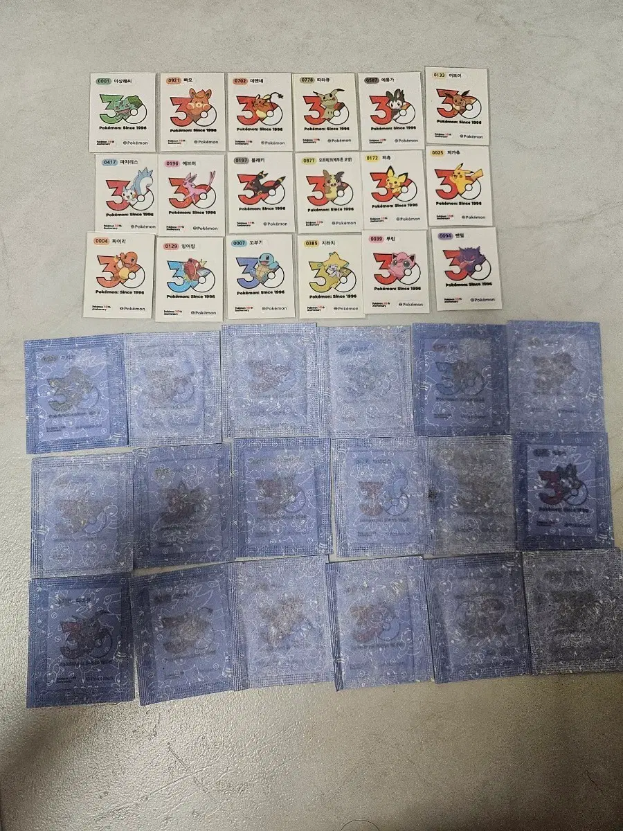 포켓몬 띠부씰 30주년 로고 18종 미개봉 판매