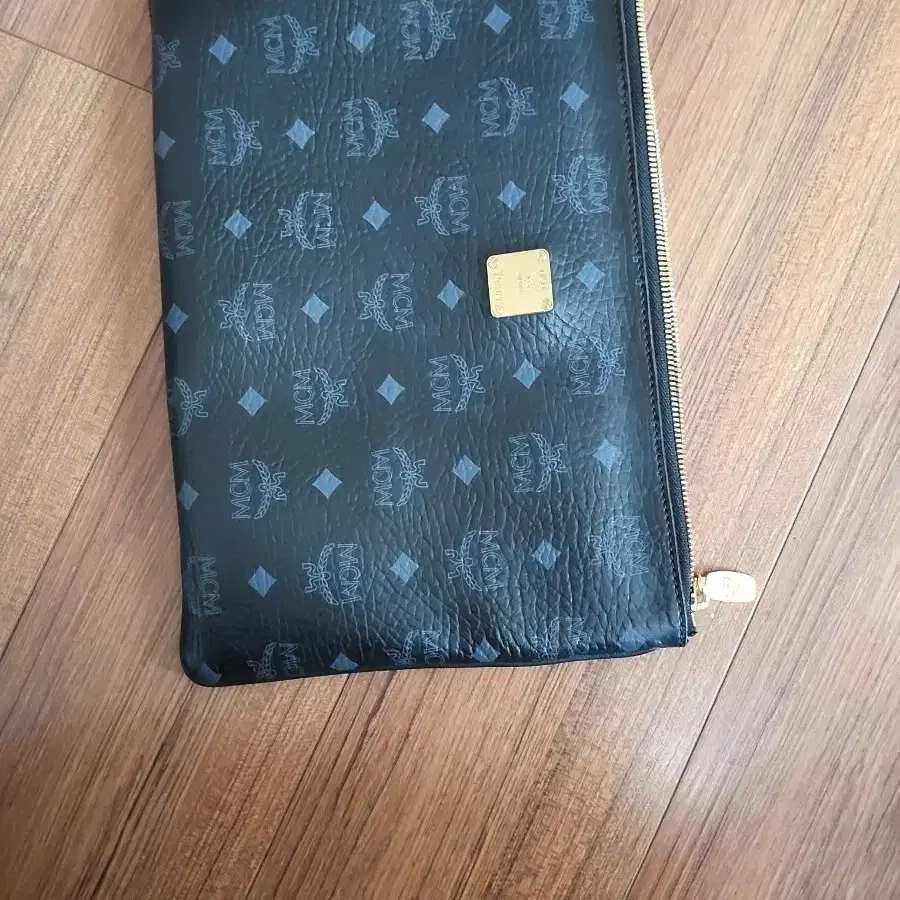 MCM 모노그램 파우치 클러치
