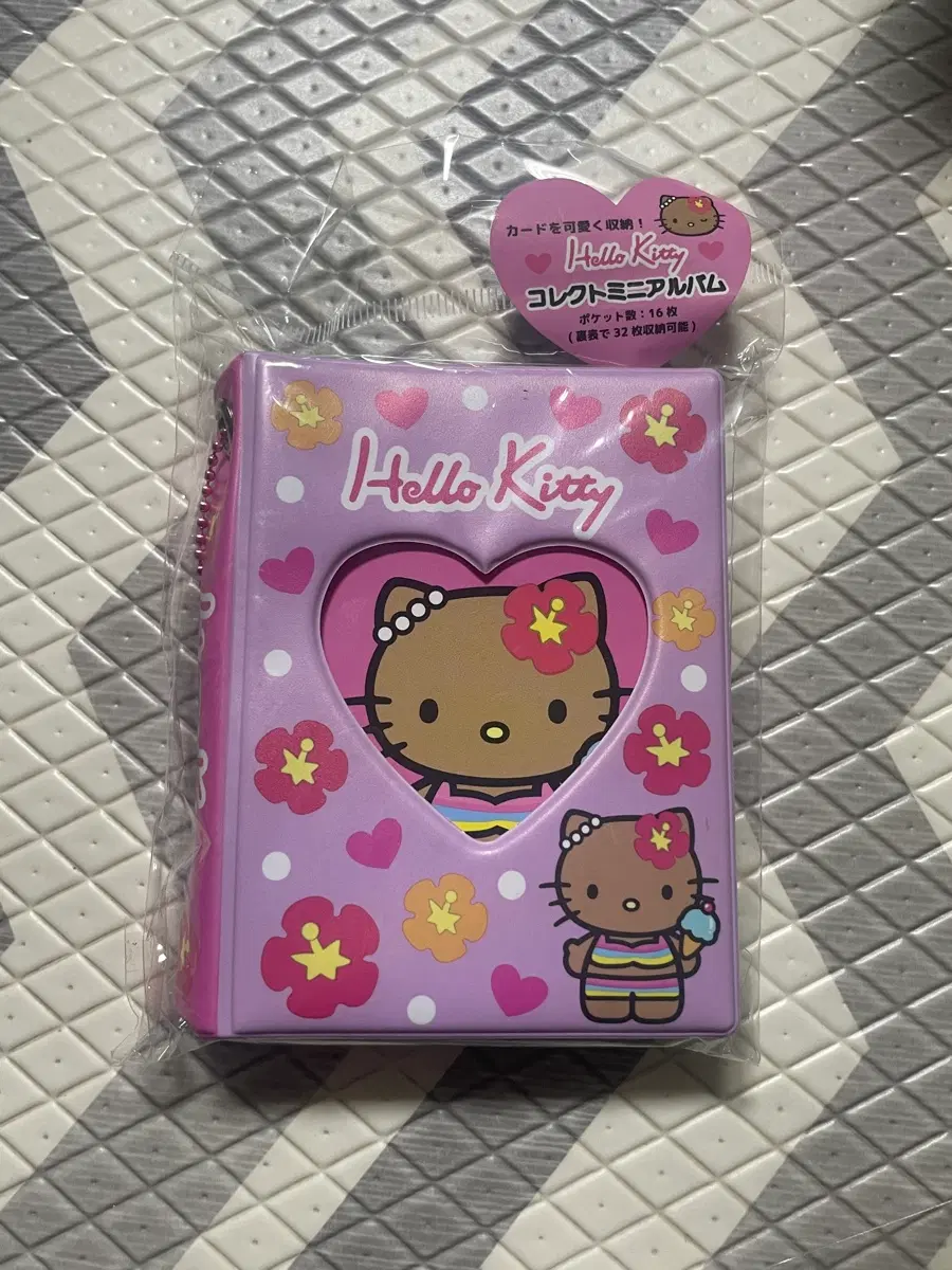 산리오 헬로키티 고고걸 미니 앨범 콜렉트 북 태닝키티