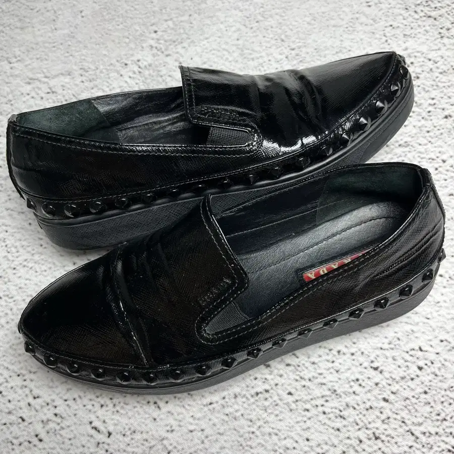 Prada Vernice Studded Loafers