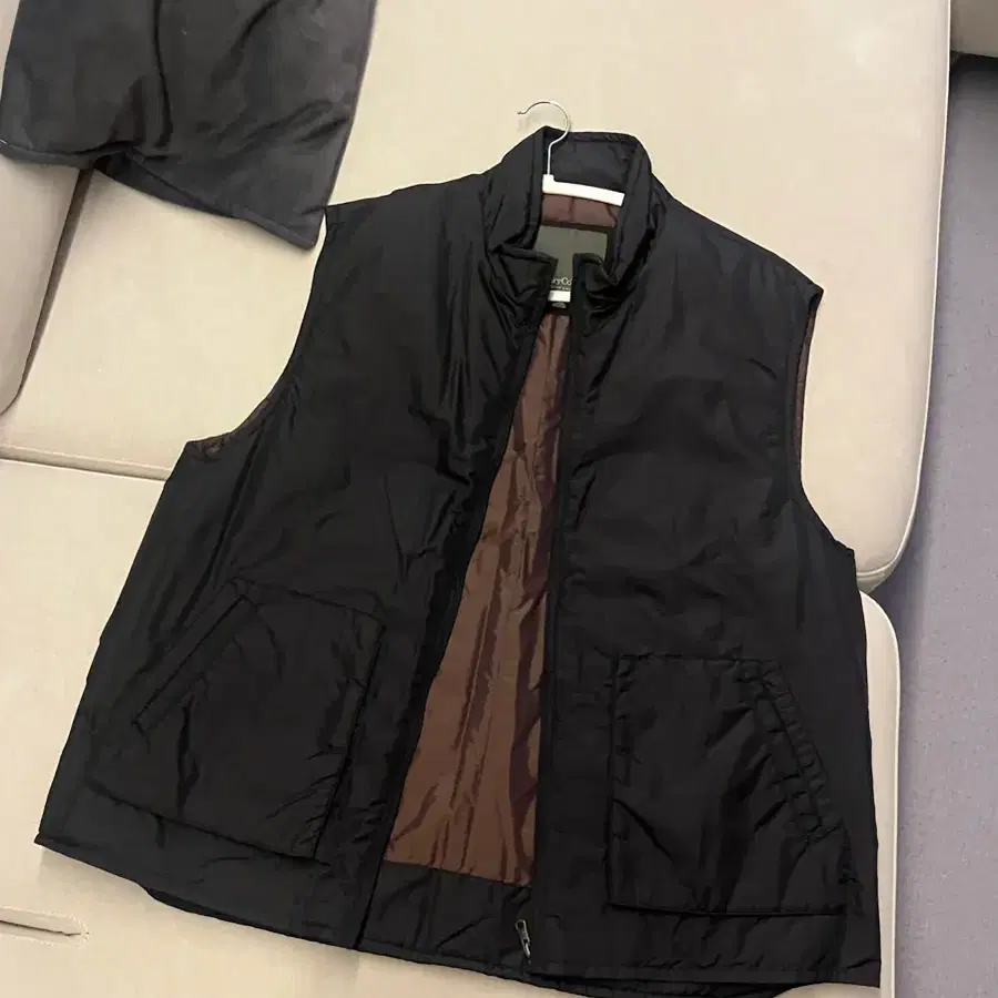 헨리코튼 나일론 블랙 브라운 패딩조끼 110