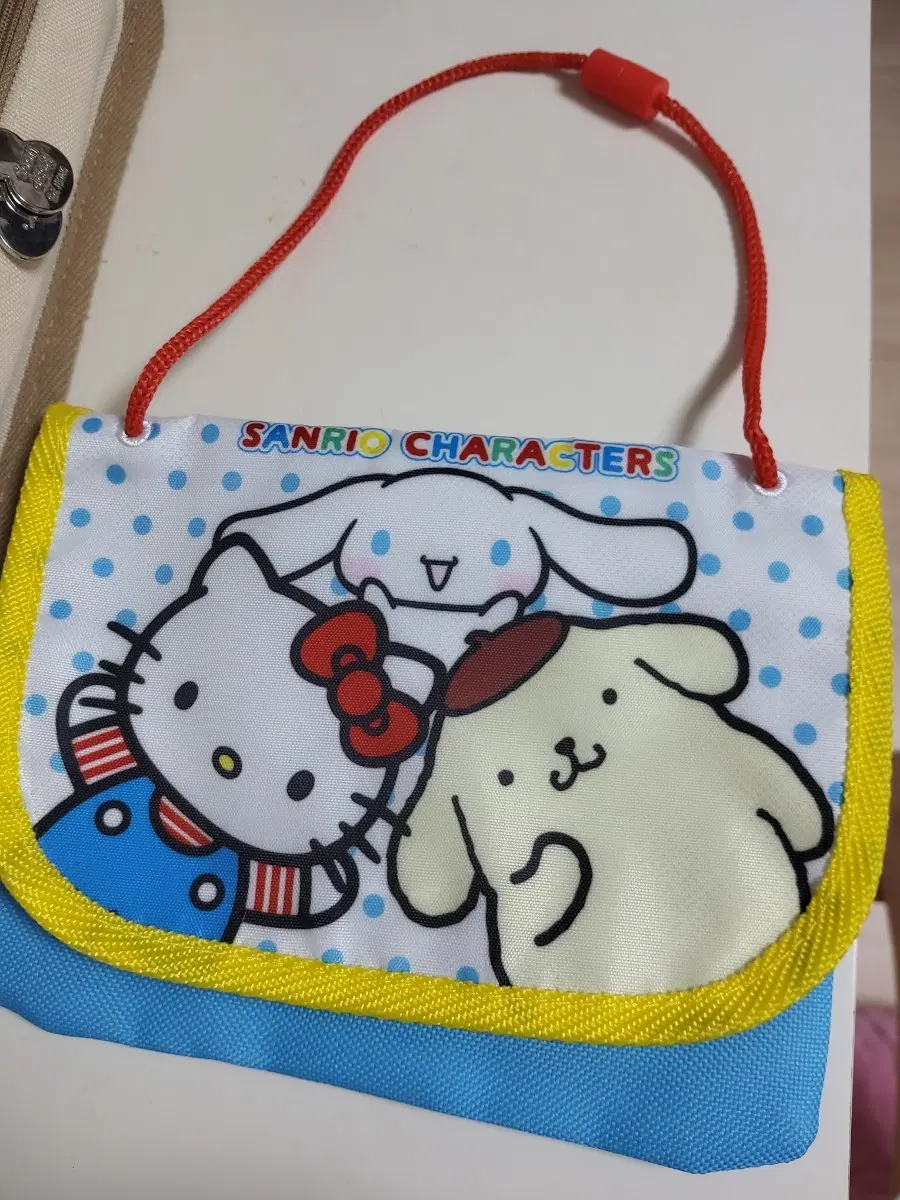산리오 끈조절 가방