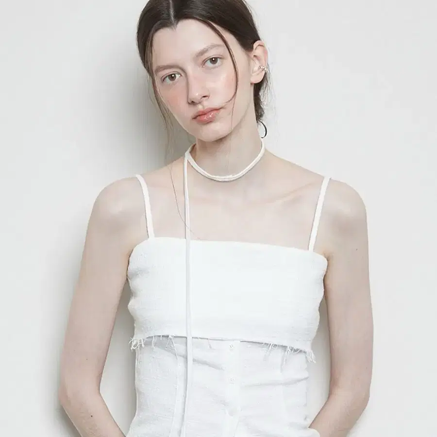 라티젠 여성용 L3 BUTTON SLEEVELESS 슬리브리스 탑