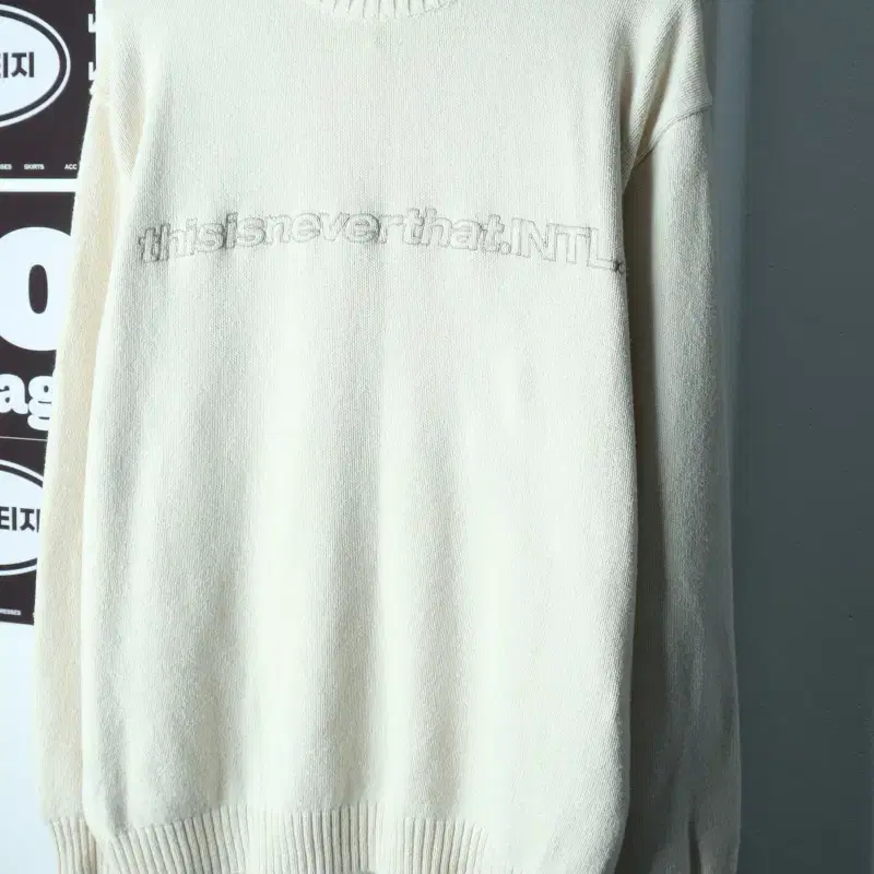 (M-XL) 디스이즈네버댓 니트 빅로고 레터링 아이보리-H39478