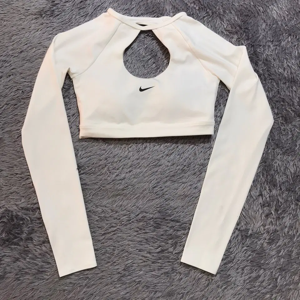 [[여성 M, A급] 나이키(NIKE) 롱슬리브 서포트패드 크롭탑1062