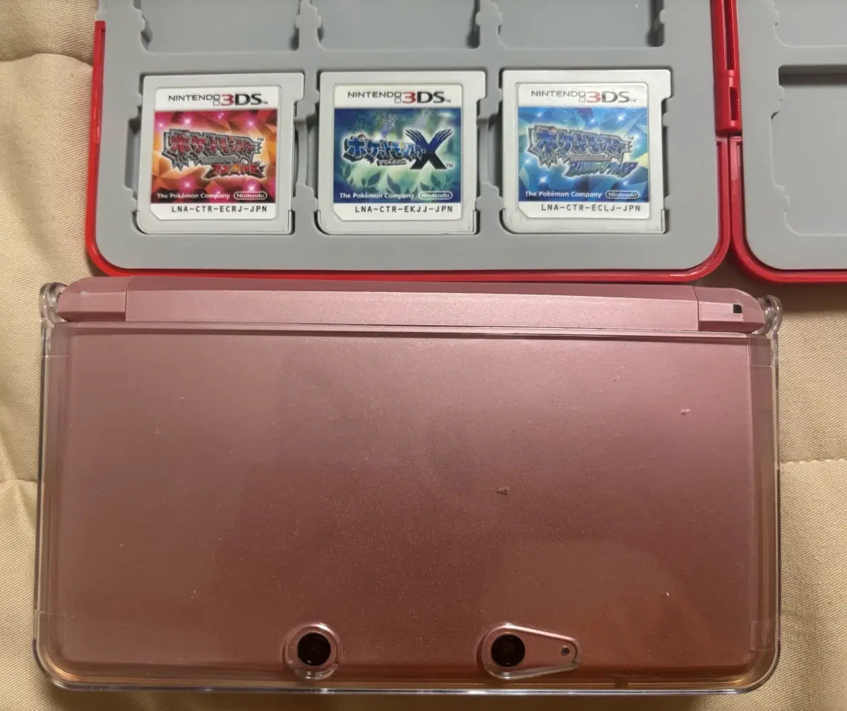 닌텐도 3DS 일본판 핑크 + 오메가루비, 알파사파이어, X 칩 일괄 판매합니다.